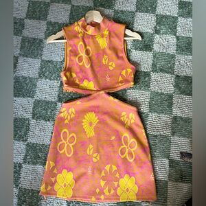 Retro mini dress with cut outs.